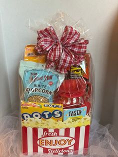 a gift basket filled with snacks and condiments