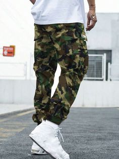 Details:Patched \nDetails:Pocket \nClosure Type:Drawstring Waist \nColor:Grey \nPattern Type:Letter \nPattern Type:Camo \nType:Cargo Pants \nWaist Line:Natural \nLength:Long \nFit Type:Loose \nFabric:Slight Stretch \nMaterial:Woven Fabric \nComposition:100% Polyester \nCare Instructions:Machine wash or professional dry clean \nPockets:Yes \nBody:Yes \nSheer:No \n Utility Cargo Pants, Pocket Cargo Pants, Teen Boy, Camo Print, Spring And Fall, Army Green, Drawstring Waist, Cargo Pants, Outdoor Sports