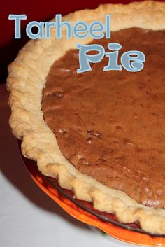 there is a tarhee pie on the plate with words above it that read tarhee pie