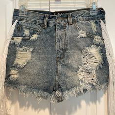 New Civil Regime Denim Shorts With Side Tussels Size M Womens. Brand New Hot Looking Beautiful Shorts Has Five Pocket And Has The Distressed Look Has Tassels On The Side ! Very Stylish A Must Have ! Summer High Waist Jeans With Fringe, Spring Denim Bottoms With Fringe, Trendy Summer Jeans With Fringe, Trendy Fringe Jeans For Summer, Trendy Fringed Summer Jeans, Distressed Denim Blue High-waisted Shorts, Dark Wash Denim Jean Shorts With Frayed Hem, High Waist Denim Jean Shorts With Fringe, High-waist Denim Jean Shorts With Fringe