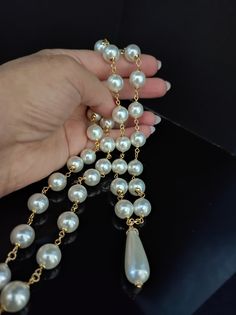 Beautiful long 1950s style necklace, made with large white Majorca pearls /12 mm/. The necklace is with a drop pendant. The necklace is very elegant, perfect for low-cut evening dresses but also for a single-colored winter sweater. The necklace is 81cm long and has an adjustable clasp with a 6cm extension. Perfect for those who love elegant style. All jewels are delivered in a decorated box, ready to be given as a gift to your loved one. How to take care of your jewellery: put on your beauty products (cosmetics, perfumes, ...) before wearing your precious jewel. Clean your jewelry with a soft cloth after wearing. Don't use water. Make sure you store your jewelry separately to avoid scratching it. Store away from heat sources, in a dry place in the special box. SHIPPING CONDITIONS I ship to Classic Pearl Drop Necklaces For Party, Classic Pearl Drop Necklace For Party, Teardrop Pearl Chain Necklace For Party, White Pearl Pendant Necklace For Party, Classic Pearl Pendant Necklace For Party, Classic Pearl Necklace With Pendant For Party, Teardrop Pearl Necklace With Pearl Charm For Party, Teardrop Pearl Drop Necklace For Party, White Teardrop Drop Necklace For Party