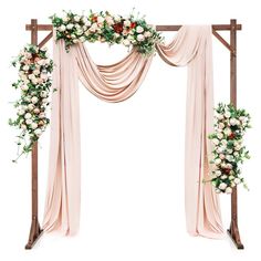 a wedding arch decorated with flowers and greenery