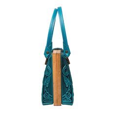 Introducing our Turquoise Teal Blue Purse, a stylish top handle bag that makes an ideal gift for her. Dimensions: 10.8 x 7.6 x 4.5 inches (27.5 x 19.5 x 11.5 cm) Material: Crafted from a combination of genuine leather and real oak wood. Please Note: The actual color of the item may vary slightly from the pictures shown on the website due to differences in monitor brightness settings on your computer. Bar Accessories Decor, Classic Office, Stylish Purse, Blue Purse, Stylish Top, Unique Bags, Office Accessories, Handle Bag, Handmade Accessories