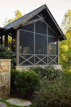 the screen - in porch is open and ready to be used as a screened - in porch