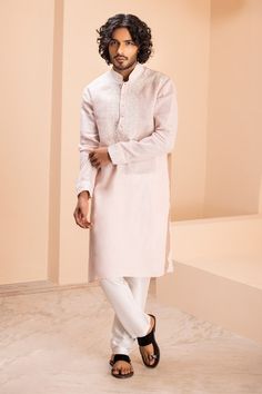 Baby pink linen kurta with placement dori embroidery on front. Paired with a contrasting plain aligadhi. - Aza Fashions Embroidered Linen Straight Kurta Set, Traditional Long Sleeve Linen Kurta, Festive Embroidered Linen Set, Eid Linen Kurta With Embroidered Border, Diwali Linen Straight Kurta, Elegant Linen Kurta With Resham Embroidery, Linen Sets With Chikankari Embroidery In Straight Kurta Style, Festive Linen Kurta With Embroidered Border, Traditional White Linen Sets