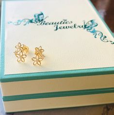 "♥ Extremely fashionable and cute are these flower stud earrings. Absolutely the perfect gift for any occasion and stacks well with other Earring styles. ♥ Details: * Made to Order. * Made in NYC. * Height: 10.4mm * Width: 6.2mm * Thickness: 1.5mm * Stone material: Available in Mined Diamonds or Cubic Zirconia * Stone shape: round * Total number of stones: 6 * Stone setting: prong * Metal: Available in solid 14k yellow, rose, or white gold * Finish: high polish * Diamond Details: ♥ We Offer : Fr 14k Gold Flower Earrings For Gift, Delicate 14k Gold Flower Earrings, Dainty Gold Hypoallergenic Cluster Earrings, Dainty Gold Cluster Earrings Hypoallergenic, Dainty Hypoallergenic Gold Cluster Earrings, Gold Flower Earrings For Bridesmaid Gift, Yellow Gold Flower Shape Cluster Earrings For Gift, Yellow Gold Flower Cluster Earrings Gift, Gold Flower Charm Earrings As A Gift For Her