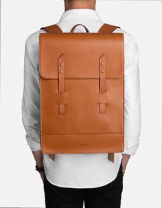 Made from durable premium Italian leather, this handsome backpack has a protective laptop sleeve, custom designed hardware, inside zip pocket, and double strap/stud closure. Available for men and women. | Miansai Harbour Rucksack Cool Backpacks For Men, Mens Bags Fashion, Mens Leather Bag, Leather Bag Women, Men's Backpack, Leather Design, Laptop Sleeve, Italian Leather, Laptop Sleeves