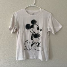 Uniqlo Ut Disney Mickey Mouse Graphic Tee Shirt (Unisex). Size Xs. Black And White. Purchased In The Uniqlo Store At Disney World. Nwot! Mickey Mouse Graphic Tee Tops, Casual Crew Neck Minnie Mouse Shirt, Casual Minnie Mouse Crew Neck Shirt, Cotton Minnie Mouse Shirt With Short Sleeves, Casual Mickey Mouse Crew Neck Top, Cute Mickey Mouse Cotton T-shirt, Casual Minnie Mouse Short Sleeve Shirt, Casual Short Sleeve Shirt With Minnie Mouse, Cute Mickey Mouse Short Sleeve T-shirt