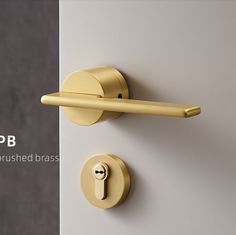 an image of a brass door handle and knob on a white wall with the words topp