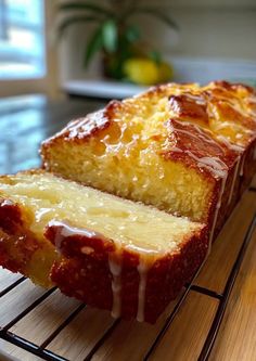 a loaf of pound cake sitting on top of a cooling rack