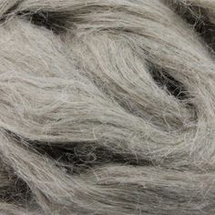 a close up view of a gray colored wool yarn with black and white lines on it