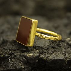 Handmade Red Agate Gold Ring | 925 Sterling Silver 24K Gold Plated | Ancient Greek Carnelian Ring | Statement Ring | Mother Gift Handcrafted hammered Silver Ring Our shop offer free ring sizing and color options.(Oxidized(Black),Gold Plated) Metal : 925 Sterling Silver Plated : 24K Gold Gemstone : Carnelian Gem Size : 15 X 15 mm Band Size : 2 mm Ring Weight : 5.00 grams Ring Size : US 6 (The size you want is made for free). (We used the US standard sizing) **Custom Orders is Made** As pellada fa Yellow Gold Chalcedony Ring Gift, Handmade Gold Chalcedony Rings, Gold Rings With Natural Stones For Gift, Gold Rectangular Ruby Ring, Handmade Yellow Gold Carnelian Jewelry, Handmade Carnelian Yellow Gold Jewelry, Rectangular Ruby Ring With Gold Setting, Gold Carnelian Jewelry With Polished Finish, Rectangular Cabochon Gold Rings