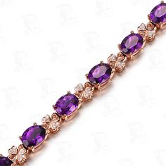 Infuse glitz and glamour into your everyday look with the luminous design of this bracelet that stuns on date night and adds a scintillating accent to your office-ready ensemble. ?0.24'' W x 6.3'' L Lobster claw clasp 18k rose gold-plated copper / cubic zirconia / genuine crystal Rose Gold Cubic Zirconia Tennis Bracelet For Party, Rose Gold Diamond Bracelet For Party, Elegant Purple Cubic Zirconia Bracelets, Party Rose Gold Cubic Zirconia Tennis Bracelet, Purple Cubic Zirconia Bracelets For Anniversary, Rose Gold Cubic Zirconia Bracelets For Party, Purple Cubic Zirconia Bracelet For Anniversary, Purple Cubic Zirconia Anniversary Bracelets, Party Rose Gold Cubic Zirconia Bracelets