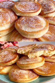 a plate full of pancakes with powdered sugar on top and another stack of pancakes in the background