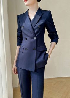 Elevate your style with the Louise Navy Blue Three-Piece Set. The double-breasted blazer exudes sophistication while the vest adds a touch of luxury. Complete the look with the nine-point pants, perfect for any business occasion. Make a statement with this exclusive, elegant set. Blazer: Double Breasted closure Notched lapels Long sleeves Front flap pockets Pants Zip fly with button closure Side slant pockets Cropped length - Polyester, spandex- Item #441501- Women's blazer & pants suit two-piece set SIZE INFO XS=US2=UK6=EU32 S=US4-6=UK8-10=EU34-36 M=US8-10=UK12-14=EU38-40 ★★ It would be helpful if you provided your height and weight so that I could assist you in choosing the appropriate size. Chic Blue Suit With Lapel Collar, Double-breasted Office Wear Pantsuit With Double Button Closure, Blue Double-breasted Suits For Business Casual, Blue Suit Collar Blazer For Office, Chic Navy Blazer With Notch Lapel, Blue Notch Lapel Blazer Dress For Work, Blue Blazer Dress For Work, Blue Double-breasted Suits For Office, Blue Double-breasted Notch Lapel Suit For Work