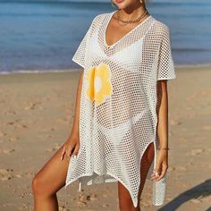 Women Casual Bikini Swimsuit Cover-Up Blouses Beach Tunic Dress One Size K529 Acrylic + cotton blend Imported Hand Wash Only The fabric has some stretch Feature: long sleeve, hollow out, crochet cover up, cover ups for swimwear women Regular fit, swim cover-ups for women, crochet cover-ups for swimwear women, swimsuit cover-up Occasions: suitable for swimwear, beach, swimming pool, summer party, and vacation Please refer to the last image for the size chart (The size chart is clothes size, NOT h Fitted V-neck Beach Cover-up, Summer V-neck Swimwear For Beach Season, Beachy V-neck Swim Dress For Beach Season, Beachy V-neck Swim Dress For Vacation, Summer V-neck Swimming Cover-up, Fitted V-neck Swimwear For Beach Cover-up, Summer Beach Dress With V-neck For Pool, V-neck Stretch Swimwear For Beach, Stretch V-neck Swimwear For The Beach