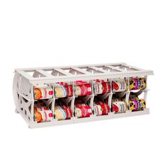 a white spice rack with six spices and two cups in it on a white background