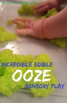 a close up of food on a plate near a child's hand and the words incredible edible ooze