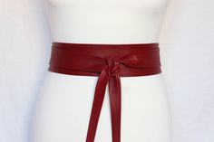 "The material is pure leather, soft and very comfortable to wear. Belts have two seams, one with a slit for easy tying. Sometimes, may need more seams due to leather's natural small dimensions. No lining. The images were taken with a 2.5-inch belt on the model (25\" waist) *IMPORTANT SIZING TIP: When selecting the size you need, please select the size that fits the best your waist measurement and the both ends will be 12\" - 15\" long. If you want the ends to be shorter then choose one size down Leather Obi Belt, Cincher Belt, Leather Wrap Belt, Plus Size Belts, Oxblood Red, Handmade Belts, Obi Belt, Wrap Belt, Belt Leather