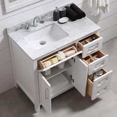 a bathroom vanity with two drawers and a sink