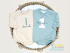 Personalize a cozy oversized sweatshirt bodysuit for your little one's big day! Very soft 100% cotton terry fabric. These are a BIG oversized/wide fit.  The length is true, but they are intentionally oversized in the width. See Size chart. * Personalization Options ** Choose a color for the number & name on your favorite romper ** To Order ** Get it just like the cream or blue-green example picture, or customize your own options In the personalization box, add the 3 personalization details (number color, name, name color) Please be sure to check your etsy convos the following business day in case we have questions! ** About ** Bodysuit is an imported blank item.  We cut and hand-press the personalization for each one at our small business in Pennsylvania. ** Timing ** Generally ships in 1- White Long Sleeve Onesie For Birthday, White Long Sleeve Onesie For First Birthday, Casual Crew Neck T-shirt For First Birthday, Playful Onesie With Name Print For First Birthday, Blue Cotton T-shirt For First Birthday, First Birthday Text Print Crew Neck T-shirt, Blue Crew Neck T-shirt For First Birthday, Baby Boy Christmas Outfit, Boys Christmas Outfits