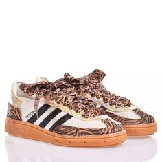 Adidas Spezial Tiger Leo is the custom sneaker youve been waiting for! The coolest model of the moment is dressed in soft animal print on the toe and back. Paired with leopard print laces and softened by holographic gold details. Adidas Spezial Tiger Leo will also be supplied with the original laces. High-top Leopard Print Sneakers For Streetwear, Leopard Print High-top Sneakers For Streetwear, Leopard Print Lace-up Sneakers For Streetwear, Leopard Print Lace-up Sneakers, Leopard Print Low-top Sneakers With Speckled Midsole, Holographic Gold, Youve Been, Ysl Sandals, Fendi Wallet On Chain