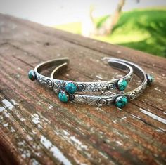 Sterling Silver floral engraved cuff bracelet with Turquoise set in copper PRICE REDUCED!!! Cattle Brands, Engraved Cuff, Jewelry Cleaning, Handmade Jewelry Bracelets, Forms Of Communication, Metal Engraving, Wide Band Rings, Bracelet Cuff, Western Jewelry