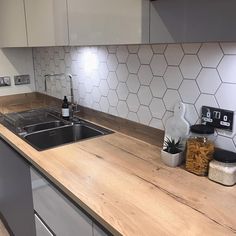 the kitchen counter is clean and ready for us to use in its new owner's home