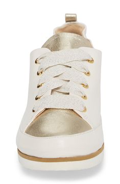 Shimmery grosgrain ribbon laces bring girly charm to a sporty lace-up sneaker featuring All Day Heels technology with a PORON-cushioned footbed for lasting comfort. Style Name:Ron White Nova Sneaker (Women). Style Number: 5376279. White Sole Sneakers With Lacing And Round Toe, Custom Leather Lace-up Sneakers With Elastic Laces, Textile Sneakers With Flat Heel And Laces, Custom Lace-up Textile Sneakers, Lace-up Walking Shoes With Elastic Laces And White Sole, Low-top Synthetic Sneakers With Lacing, Lace-up Sneakers With Removable Insole And White Sole, White Round Toe Sneakers With Lacing, White Sneakers With Lacing And Round Toe