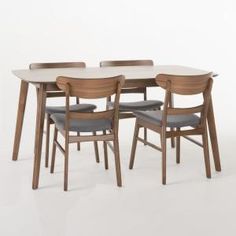 a table with four chairs around it