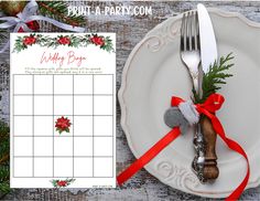 a plate with a knife and fork on it next to a christmas themed holiday calendar