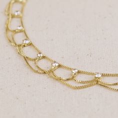 Adorn your ankle with the exotic charm of this 18k gold filled Bali anklet. Inspired by traditional Balinese craftsmanship, this delicate piece features intricate detailing and a timeless design. The lustrous gold finish complements sun-kissed skin, making it perfect for beach vacations or adding a touch of bohemian elegance to everyday wear. Metal: 18k gold filled 1/20 Size: 9 inches with 2 inches extender 0.8mm Box Chain Hypoallergenic jewelry. Anti-tarnish jewelry. Waterproof Made in Brazil Elegant Adjustable Gold Anklets, Dainty Gold Anklet With Delicate Chain, Elegant Yellow Gold Anklets With Delicate Chain, Gold Plated Adjustable Chain Anklets, Gold-plated Adjustable Anklets, Gold Plated Anklet With Adjustable Chain, Adjustable Gold Anklet With Delicate Chain, Delicate Gold Anklet With Adjustable Chain, Dainty Gold Anklets For Wedding