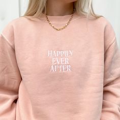 Reach out and find your Happily Ever After ✧ Our vintage pigment-dyed sweatshirts are so comfy and lightweight, you won't want to take it off and you'll have it for years! Now in a spring dusty pink/peach color, this crewneck is embroidered for a subtle, monochromatic design so you can wear the magic wherever you are, any day. This sweatshirt has an oversized fit. Model is 5'5" and wearing a size medium. Features 80% ring spun cotton, 20% polyester blend 100% cotton 30 singles face yarn split st Spring Washed Sweatshirt For Loungewear, Spring Loungewear Washed Sweatshirt, Spring Washed Sweatshirt In Relaxed Fit, Spring Washed Relaxed Fit Sweatshirt, Spring Acid Wash Sweatshirt, Spring Washed Crew Neck Sweatshirt, Spring Washed Crew Sweatshirt, Pink Crew Neck Soft-washed Sweatshirt, Pink Soft-washed Crew Neck Sweatshirt