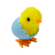 a yellow and blue toy bird with an egg in it's beak