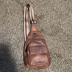 Nwot Never Used Brown Vegan Leather Adorable Cross Body Sling Bag With Lots Of Pockets. Casual Brown Crossbody Chest Bag, Trendy Brown Chest Bag Backpack, Brown Crossbody Chest Bag With Detachable Strap, Brown Chest Bag With Adjustable Strap For On-the-go, Casual Brown Chest Bag With Detachable Strap, Trendy Brown Chest Bag With Single Shoulder Strap, Brown Chest Bag With Adjustable Strap, Casual Brown Chest Bag With Single Shoulder Strap, Casual Brown Chest Bag With Single Strap