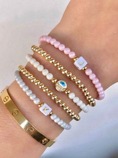 Flirty and feminine - these pastel and gold filled stacks are perfect for everyday wear! Colorful Bracelet Stack, Bracket Stacks, Preppy Bracelet Stack, Preppy Jewlery, Pretty Stacks, Bracelets Preppy, Gold Beaded Bracelets, Bracelets Pink, Preppy Accessories