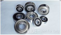 six different types of ball bearing units on a white surface with the words inside just for easy