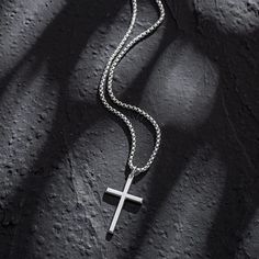 Faith is what determines one's mind, and distinguishes one from others. Simplicity meets masculine and spiritual power for a sleek look. Discover all our sleek 925 silver jewelry for men and find a gift for him. here Made with white gold plated 925 sterling silver. Dimension: 40 mm Length: 24 inches Chain: Box Chain 60 cm/ 23.6 Inches with Lobster Clasp Weight: 9.98g Origin: Imported More Choices Minimalist Box Chain Jewelry For Father's Day, Silver Cross Necklace For Father's Day Gift, Minimalist Sterling Silver Necklace For Father's Day, Minimalist Silver Stainless Steel Cross Necklace, Classic Silver Pendant Cross Necklace, Classic Silver Cross Pendant Necklace, Classic Silver Sterling Silver Cross Necklace, Classic Cross Necklace In Sterling Silver And White Gold, Classic Sterling Silver Cross Necklace In White Gold