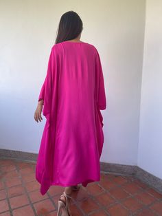 Dive into a world of vibrant color with our solid color kaftan. Crafted with meticulous care and attention, these kaftans offer a burst of style and creativity. Whether you're lounging at home, heading to the beach, or stepping out for an evening on the town, our rich dye color kaftan is the perfect choice to make a bold and unforgettable fashion statement. Summer Long Sleeve Pink Abaya, Traditional Pink Kaftan For Beach Cover-up, Pink Long Sleeve Kaftan For Eid, Pink Beach Dress For Eid, Eid Beach Kimono, Pink Long Sleeve Kaftan For Beach Cover-up, Elegant Pink Kaftan For Beach Cover-up, Pink Long Sleeve Beach Cover-up Kaftan, Pink Bohemian Long Thobe