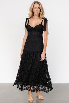 Timeless charm and modern details create a memorable look Black lace over lining Sweetheart neckline Padded bust Hidden zipper at back for closure Self-tie sleeve straps Single-tiered skirt Self and Lining: 100% Polyester Trina is 5'6, cup size 32D, size 2 and is wearing size S Elegant Dress With Sweetheart Neckline And Lace Closure, Evening Dress With Sweetheart Neckline And Lace Closure, Lace Dresses With Sweetheart Neckline, Sweetheart Neckline Lace Dresses With Lace Closure, Black Lace Dress With Lace-up Back, Lace Midi Dress With Sweetheart Neckline For Night Out, Lace Dress With Tie Back And Sweetheart Neckline, Sweetheart Neckline Midi Dress With Scalloped Lace For Party, Party Midi Dress With Scalloped Lace And Sweetheart Neckline