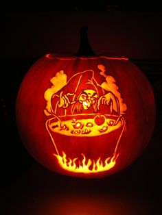 a carved pumpkin with an image of a wizard in a bathtub on it's face