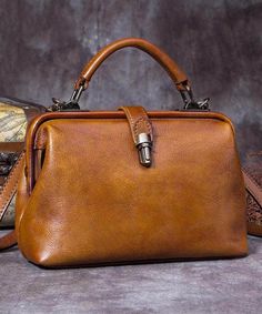 Art Brown Durable Calf Leather Satchel HandbagThis bag is made of fine Calf Leather fabric.Measurement: 22cm/8.58" * 14.2cm/5.538" * 8cm/3.12"Zip up closure. Inside pockets. Vintage Box Bag For Daily Use With Large Capacity, Retro Business Crossbody Shoulder Bag, Retro Satchel Box Bag With Large Capacity, Vintage Large Capacity Satchel For Office, Retro Large Capacity Satchel Box Bag, Office Satchel With Top Carry Handle, Vintage Office Satchel With Large Capacity, Retro Leather Shoulder Bag With Detachable Handle, Retro Leather Top Handle Box Bag