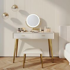 a dressing table with a mirror, stool and candles on it next to a bed