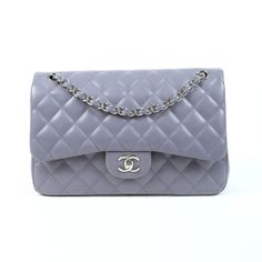 MENU Handbags Clothing Shoes Jewelry Accessories Home Kids Mens Chanel Jumbo Classic Flap Purple Quilted Lambskin Leather CC Shoulder Bag Circa 2011. Chanel Jumbo Classic Flap bag is crafted from quilted lambskin and features silver tone hardware, an adjustable interwoven chain strap, back slip pocket, flap with a CC logo turn lock closure, and a leather interior with five slip pockets and a zipped pocket. Serial #: 15656091 Size: Jumbo LGS Size: Color*: Purple, Made in: Italy Fabric Content: Le Chanel Handbags Tote, Chanel Handbags Red, Chanel Handbags Collection, Chanel Classic Jumbo, Chanel Handbags Classic, Chanel Double Flap, Chanel Jumbo, Classic Flap Bag, Crossbody Handbags