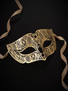 Our laser-cut metal mask boasts a stunning gold finish that shines and shimmers, ensuring you stand out in any crowd. Crafted with your comfort in mind, our mask is lightweight and easy to wear for hours on end.


Age Group/Gender - Adult/Men

Size/Type - One size fits all adults

Mask Color - Gold

Mask Material - Laser cut metal Elegant Gold Masquerade Mask As Gift, Gold Eye Mask For Carnival, Gold Eye Masquerade Mask, Elegant Gold Eye Mask For Masquerade, Gold Carnival Masquerade Eye Mask, Gold Masks For Evening Carnival, Elegant Gold Eye Masquerade Mask, Gold Carnival Masks For Evening, Gold Eye Mask As Gift