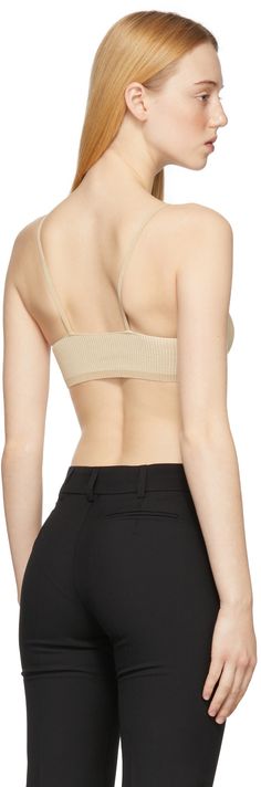 Rib knit viscose and nylon-blend bra in beige. Supplier color: Beige Seamless Beige Bra For Spring, Fitted Beige Bra With Adjustable Straps, Fitted Beige Bra With Removable Pads, Fitted Beige Crop Top With Adjustable Straps, Fitted Padded Beige Bra, Rib Knit, Spaghetti Strap, Spaghetti, Women Wear