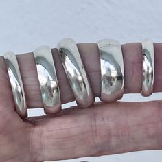 Solid 925 sterling silver band in different widths and sizes. Artisan made. Vintage. Never worn.  Lovely for wedding bands. Pick yours. Here is what is available: The widest 8mm Size 8 1/4 7.5mm Size 8 7mm Size 11.5 7mm Size 5 7mm Size 4 1/2 6.5 mm Size 12 4mm Size 11 3/4 4mm Size 7 1/4 Your ring will come in a gift bag and shipped with care. Our sterling silver is solid 925 sterling silver. Polishing cloth is included. We have been selling sterling silver jewelry since 1994. Guaranteed satisfac Ring Wedding Band, Thumb Ring, Ring Minimalist, Thumb Rings, Stackable Ring, Sterling Silver Bands, Ring Wedding, Stackable Rings, Stainless Steel Chain