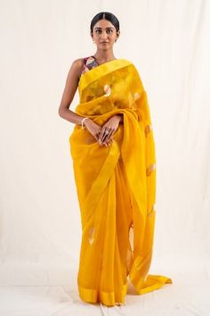 Deep yellow silk organza saree with gold floral buttis and solid border. Comes with an unstitched blouse piece. - Aza Fashions Deep Yellow, Yellow Silk, Organza Saree, Silk Organza, Gold Floral, Blouse Piece, Yellow Floral, Aza Fashion, Hand Weaving