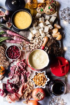 an assortment of food is laid out on a table