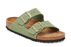 Birkenstock women's Arizona soft footbed sandal. Two-strap elegant sandal with soft insole for extra comfort. Suede leather upper slide. Suede lining and EVA outsole. Made In Germany. Birkenstock footwear is manufactured in two widths: regular and narrow. Narrow width is designed to accommodate an A-B width for women and fits more like a medium than a true narrow. Classic Flat Footbed Sandals For Spring, Classic Slide Footbed Sandals For Spring, Classic Footbed Sandals For Spring Vacation, Classic Spring Footbed Sandals For Vacation, Classic Footbed Sandals For Vacation In Spring, Classic Spring Vacation Footbed Sandals, Classic Spring Footbed Sandals With Textured Footbed, Spring Comfortable Leather Footbed Sandals, Green Leather Footbed Sandals Casual Style